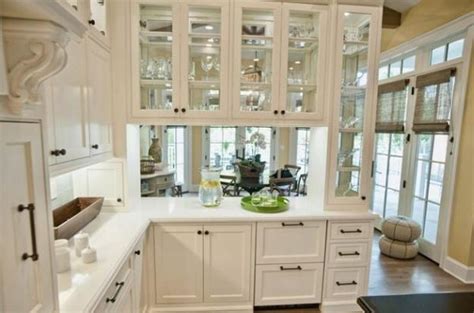Glass kitchen cabinets with lights. Decorating with Glass Cabinets Doors Brings Light into ...