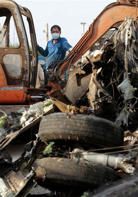 Taiwan Plane Crash Survivor Crawls Through Hole Phones Dad To Pick Her