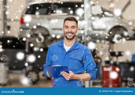 Happy Mechanic Man With Clipboard At Car Workshop Stock Image Image