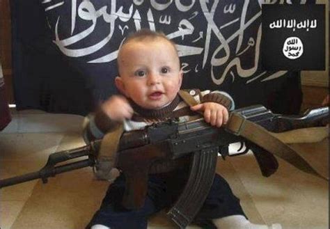 Shocking Isis Photos Shows Baby Holding An Ak 47 And Lying On Islamic