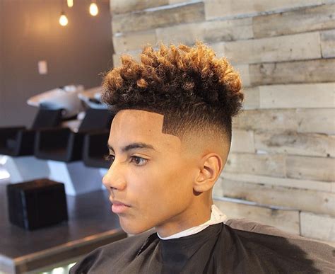 This is one of the trendiest haircuts for black men, particularly young men. 50+ Curly Hair Hairstyles For Men (2020 Update) | Black ...