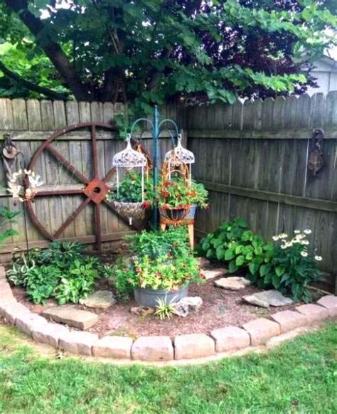 An Outdoor Garden With Lots Of Flowers And Plants In The Center Along