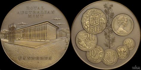 An Australian Medal Featuring The Canberra Mint And Australian Decimal
