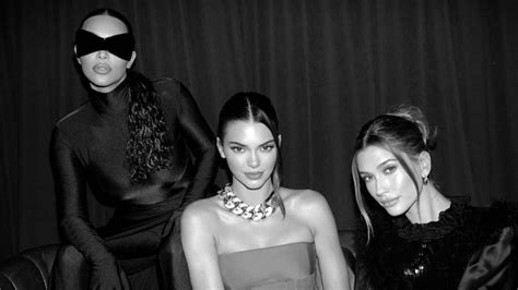 Kim Kardashian Shows Off Skinny Frame In Skin Tight Black Catsuit While