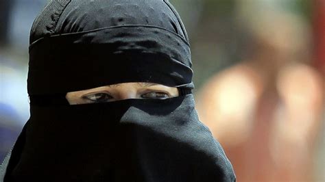 ‘burqa ban comes into force swiss region imposes first fines — rt world news