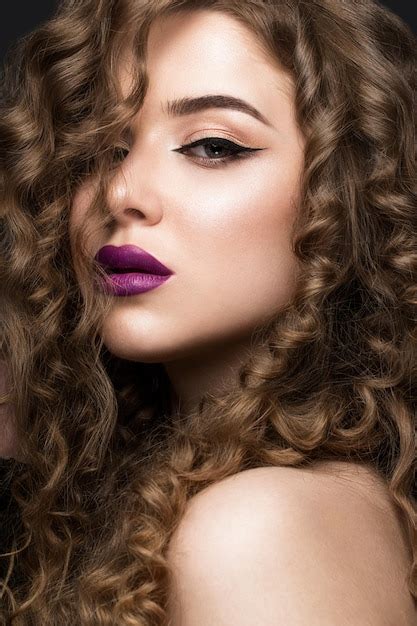 Premium Photo Beautiful Brunette Girl With A Perfectly Curly Hair And Classic Makeup Beauty Face