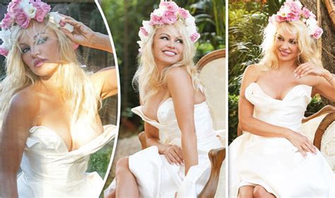 Pamela Anderson S Large Assets Spill Out Of White Plunging Gown