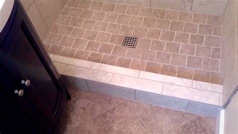 No matter where you are laying tiles — in the bathroom or elsewhere — it's important to properly mark your datum line, blend the mixture well, and cut and lay the tiles with extreme care! Install a tile shower in a small bathroom - YouTube