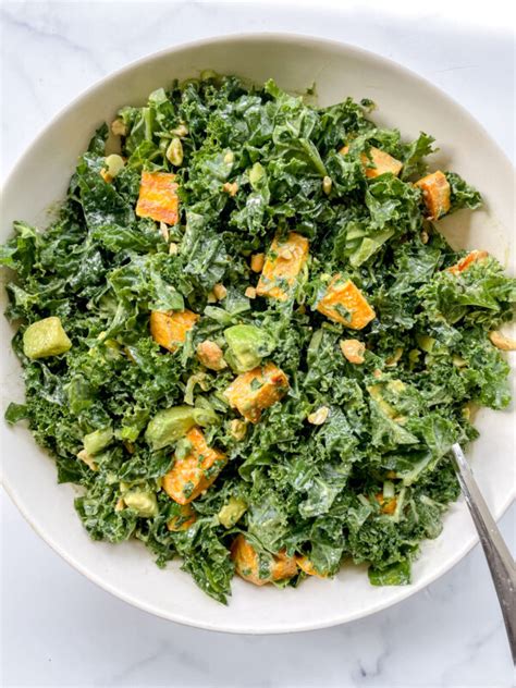 Roasted Sweet Potato Kale Salad With Spicy Cashew Herb Dressing