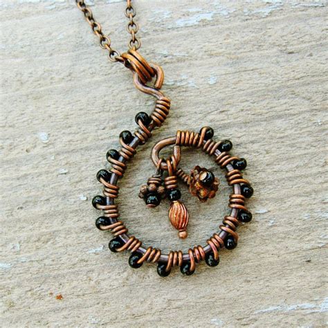 Antiqued Copper Wire Wrapped Swirl Necklace With Black Beads And