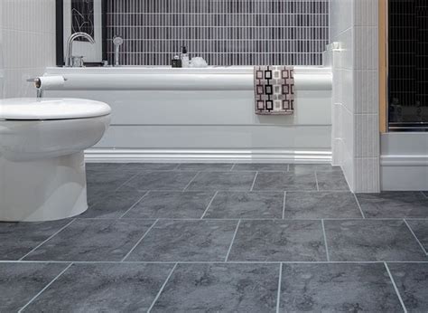 Grey Vinyl Flooring In Washroom That Resembles Marble With White And