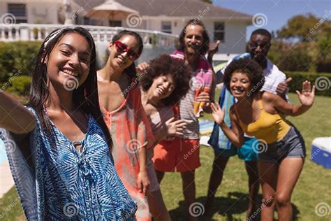 Portrait Of Diverse Group Of Friends Taking Selfie At A Pool Party Stock Image Image Of