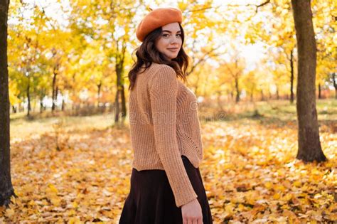 Outdoor Portrait Of Young Beautiful Woman In Autumn Park Warm Autumn