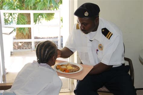 Nevis Custom Officers Visit Elderly At Flamboyant Nursing Home