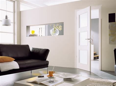 The concept of having such living room cabinets with glass doors is not the thing. White glass panel interior doors for living room divider ...