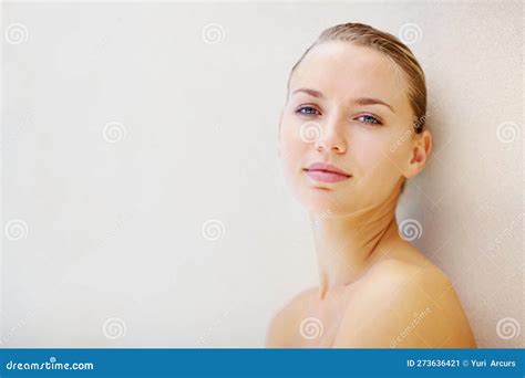 Pretty Topless Female Isolated Against A Brown Wall Portrait Of A Cute