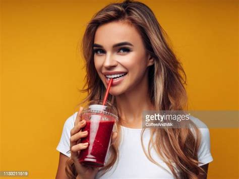 Woman Drinking Smoothie Close Up Photos And Premium High Res Pictures Getty Images