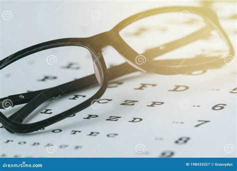 Glasses On The Eye Sight Test Chart Stock Image Image Of Equipment Medical 198433327
