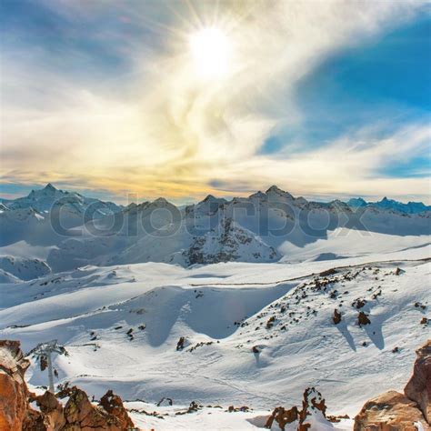 Snowy Blue Mountains In Clouds Winter Stock Image Colourbox