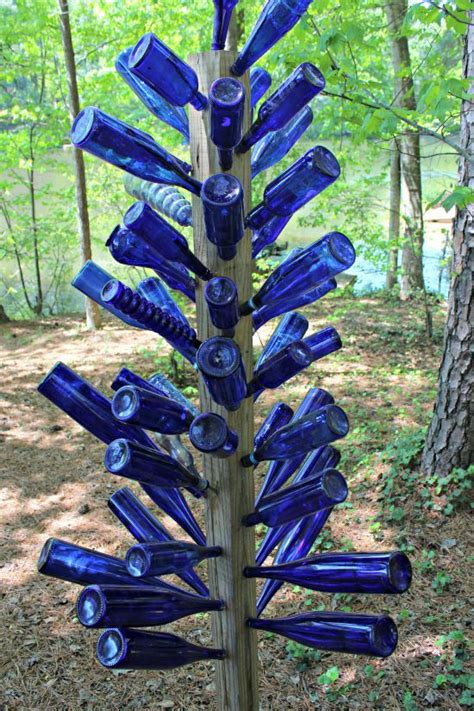 Blue Bottle Tree Mother S Garden Bottle Art Bottle Trees Bottle Tree Wine Bottle Trees