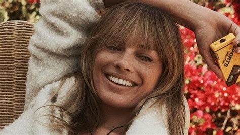 Margot Robbie Stuns In ‘70s Inspired British Vogue Photo Shoot