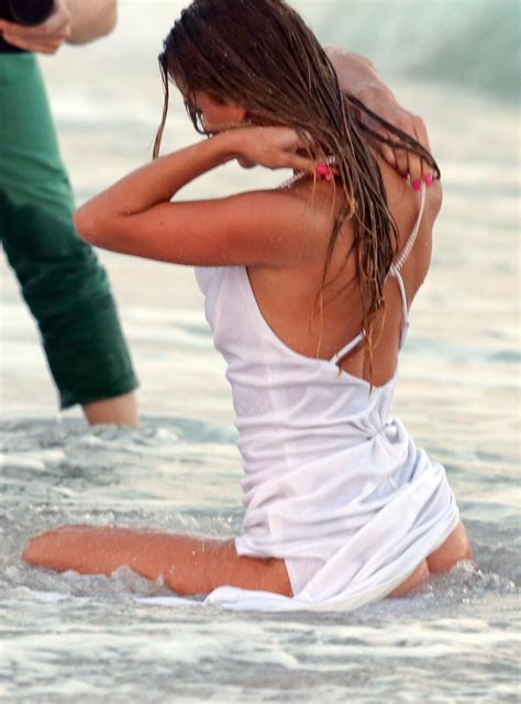 Nina Agdal Has A Couple Wardrobe Malfunctions While Navigating The Surf For A Photoshoot 25
