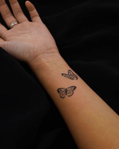 Sexiest Butterfly Tattoo Designs In Butterfly Tattoos On Arm Butterfly Tattoo