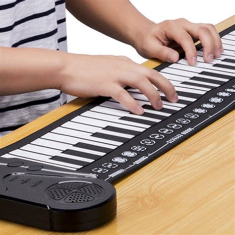 Piano keys are laid out in a 12 note pattern (above). 2020 49 Key Folding Hand Roll Piano Silicone Portable Hand ...