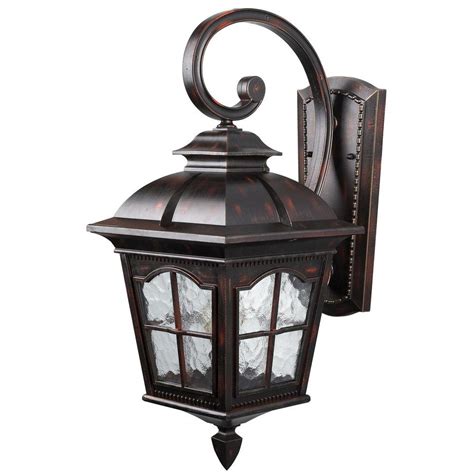 In a handsome bronze finish, this outdoor wall light offers a traditional rustic design for your home. CANARM Madison 1-Light Rustic Bronze Outdoor Wall Lantern ...