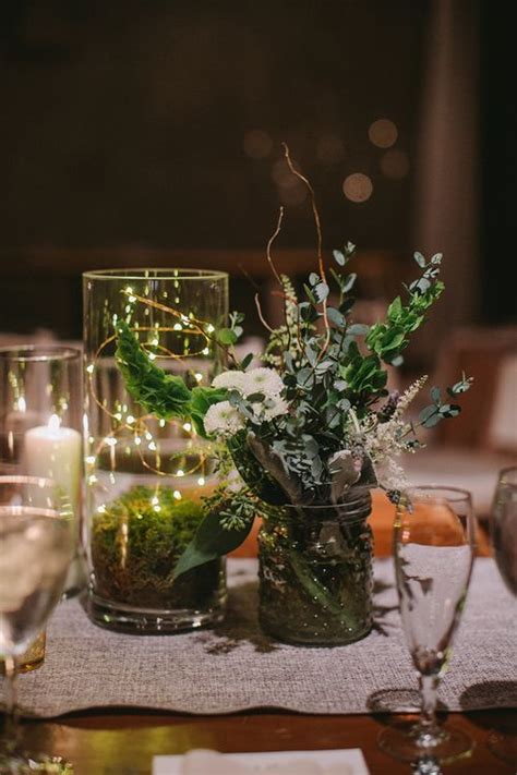 Romantic And Modern Wedding Centerpiece With Candles Moss Fairy