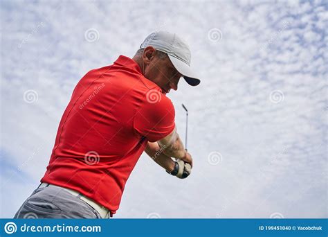 Professional Male Athlete Improving His Golf Upswing Stock Photo