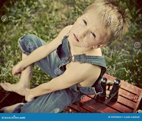 Boy In Dungarees Stock Images Image 25294624