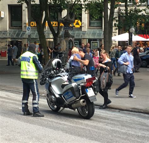 German Police Officer Let Little Kid Sit On His Police Motorcycle