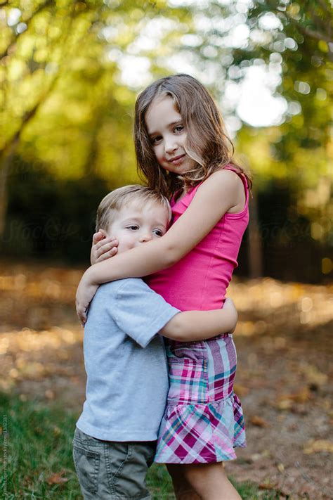 Big Sister Hugging Her Little Brother Porjakob Lagerstedt