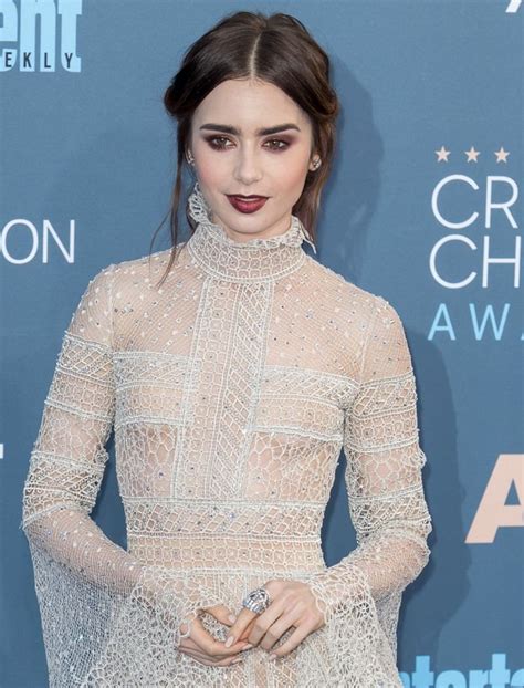 Gothic Glam Lily Collins Wearing A Lacy Sheer Dress Featuring Billowy