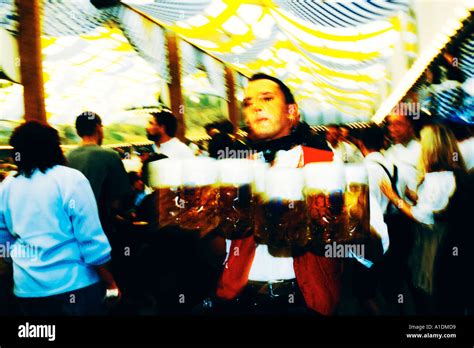 Germany Munich Oktoberfest Waiter With Beers Stock Photo Alamy