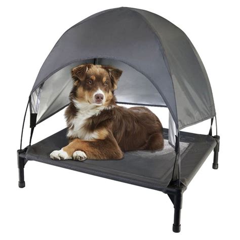 It lifts your canine off the hard cold floor giving him a warm and comfortable place to rest or sleep all through #1 niubya elevated dog cot with canopy. Paws & Claws Elevated 70x63cm Kennel Medium Dog Bed ...