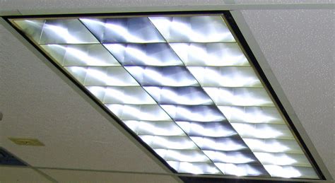 The lights were covered by plastic sheets inserted on a metal frame. Fluorescent Fixtures Converted to LED - Commercial ...