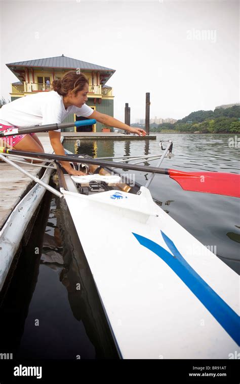 A Teenage Girl Fits Her Oars In A Rowing Skull Youth Rowing Program