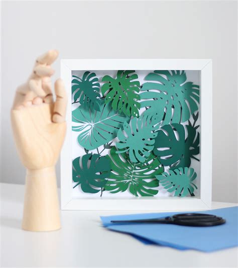 Each is painted and clear coated for durability. Easy Tropical Wall Art DIY | Paper Crafts | The Crafty Gentleman blog