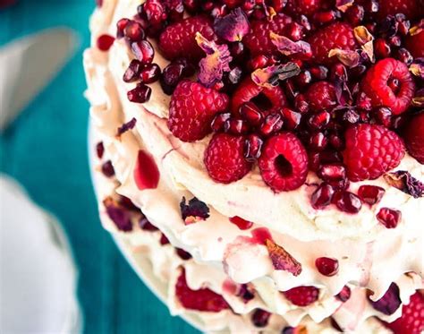 This ethereal crown of meringue, filled with cream and berries is a pavlova. Love Meringue? 15 Pavlova Recipes You Need To Try - Brit + Co