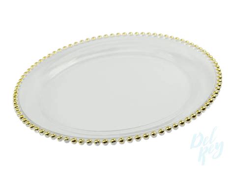 Our silver and gold charger plates add beauty to wedding and dinner table settings. Gold Beaded Clear Glass Charger Plate - Del Rey Party Rentals