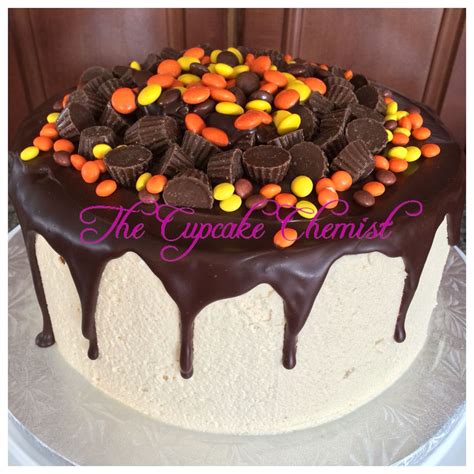 Chocolate Peanut Butter Drip Cake With Mini Reese Cups And Reeses