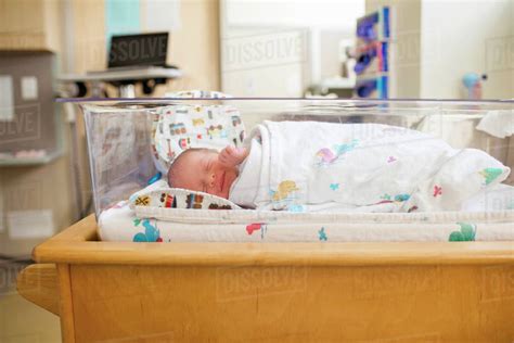 Newborn Baby Boy Sleeping In Crib At Hospital Stock Photo Dissolve