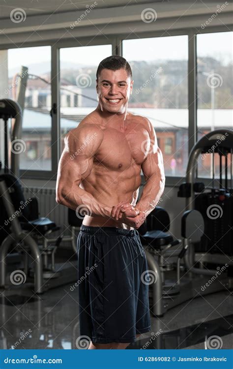 Bodybuilder Performing Side Chest Pose Stock Photo Image Of Flexing