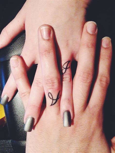 Pin By Alissa Dias On Tattoos Wedding Ring Finger Tattoos Finger Tattoos Tattoo Wedding Rings