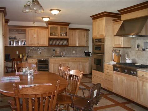 You can even apply a third coat if you want a darker tone. two toned wood stained cabinets | clip this post email ...