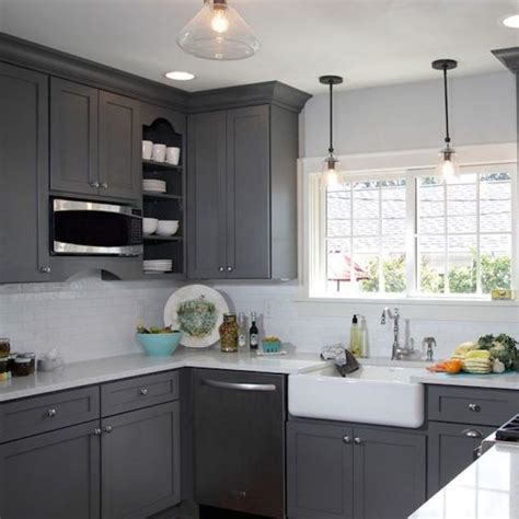 The color of these kitchen cabinets is lunar grey, and it works so well with brass hardware. The Perfect Neutral Gray Paint Color! - Happily Ever After ...