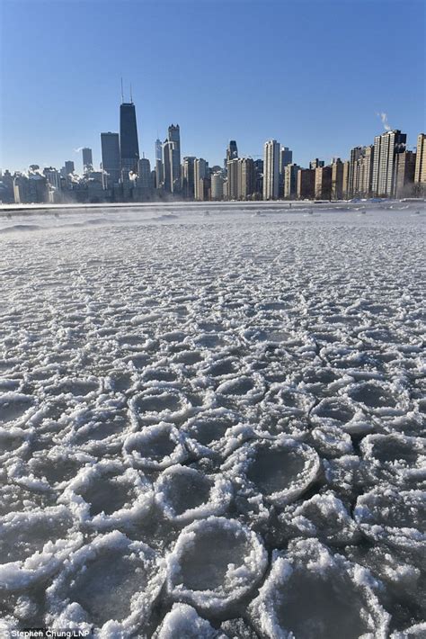Flipping Out Pancake Ice Forms On Chicagos Lake Michigan Daily Mail