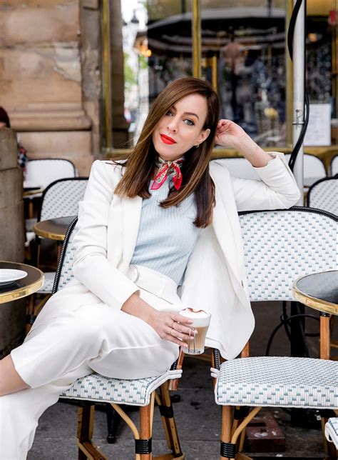 sydne style shows how to dress like a french girl with neck scarf and red lips with white suit